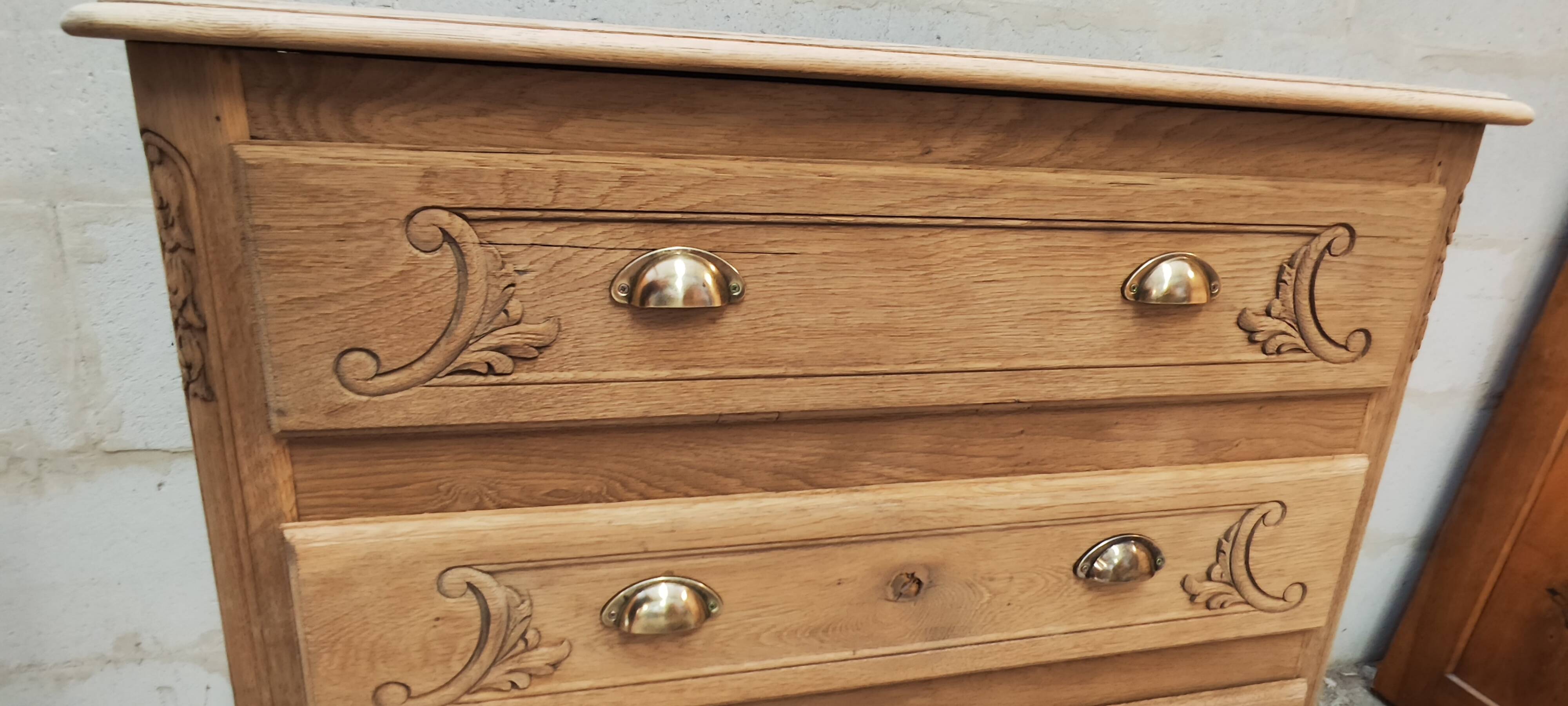 Old chest of drawers with three drawers in raw solid oak