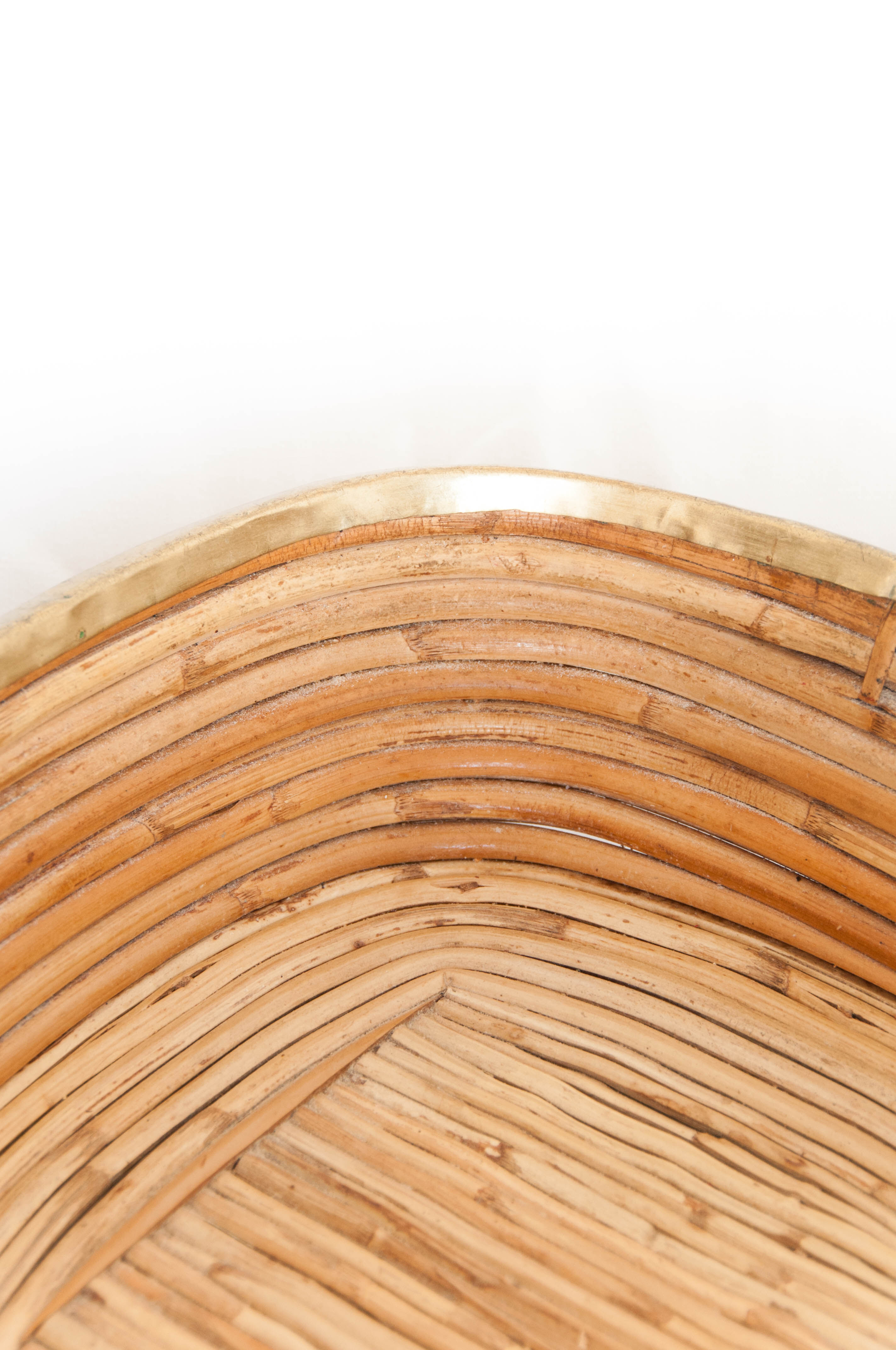 Vintage brass-rimmed rattan basket