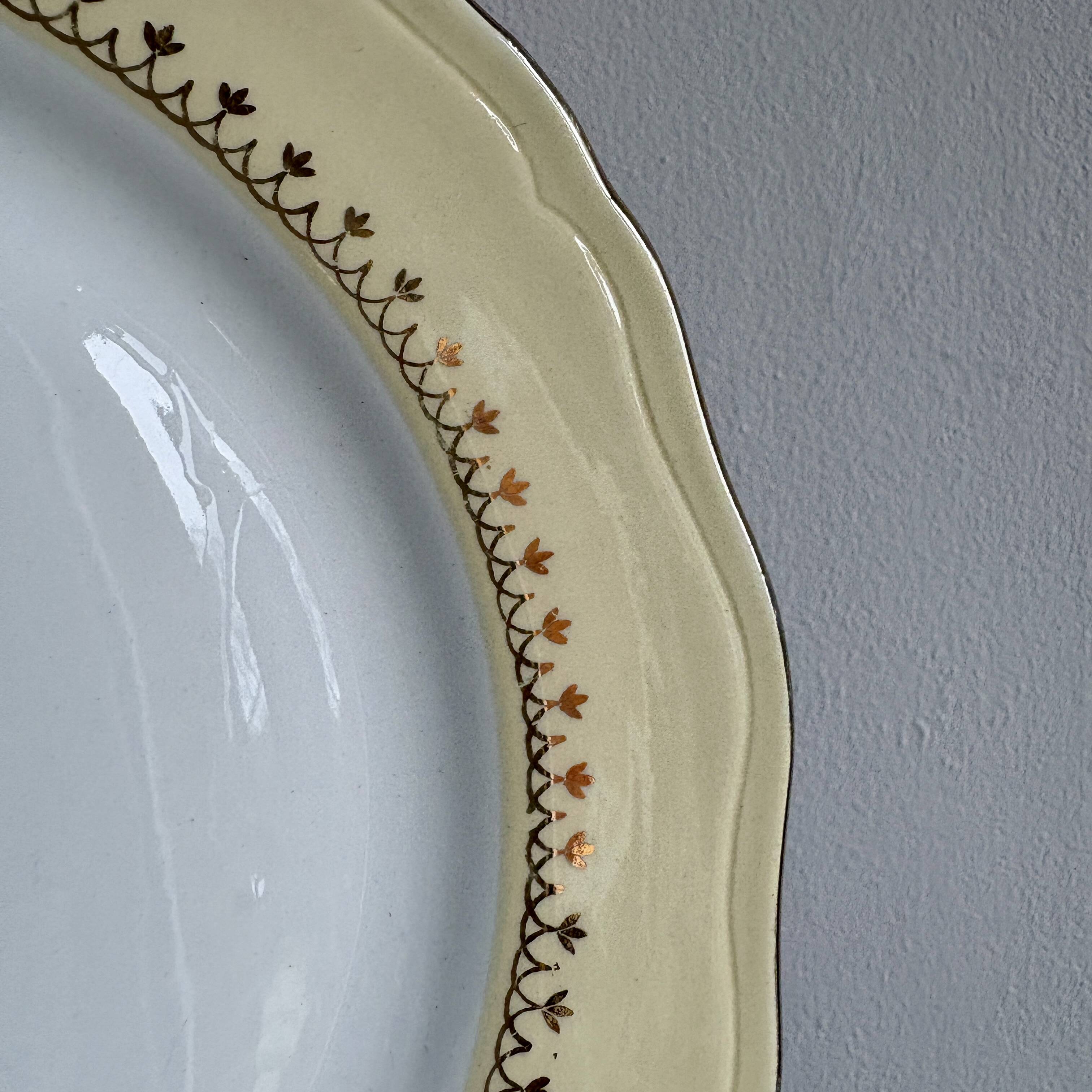 Set of 6 vintage white dinner plates with yellow and gold trim.