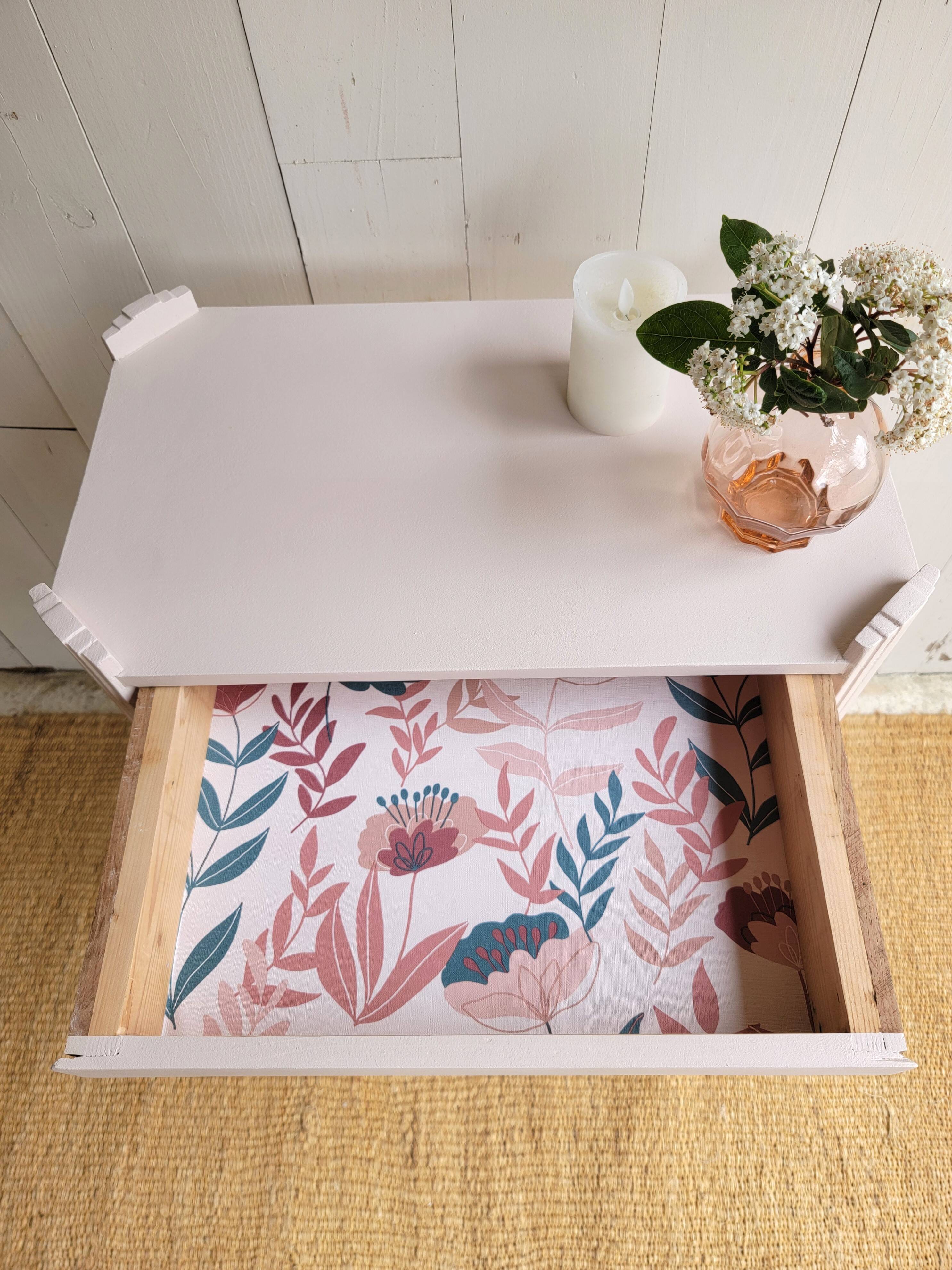 Small renovated Art Deco console in nude colour.