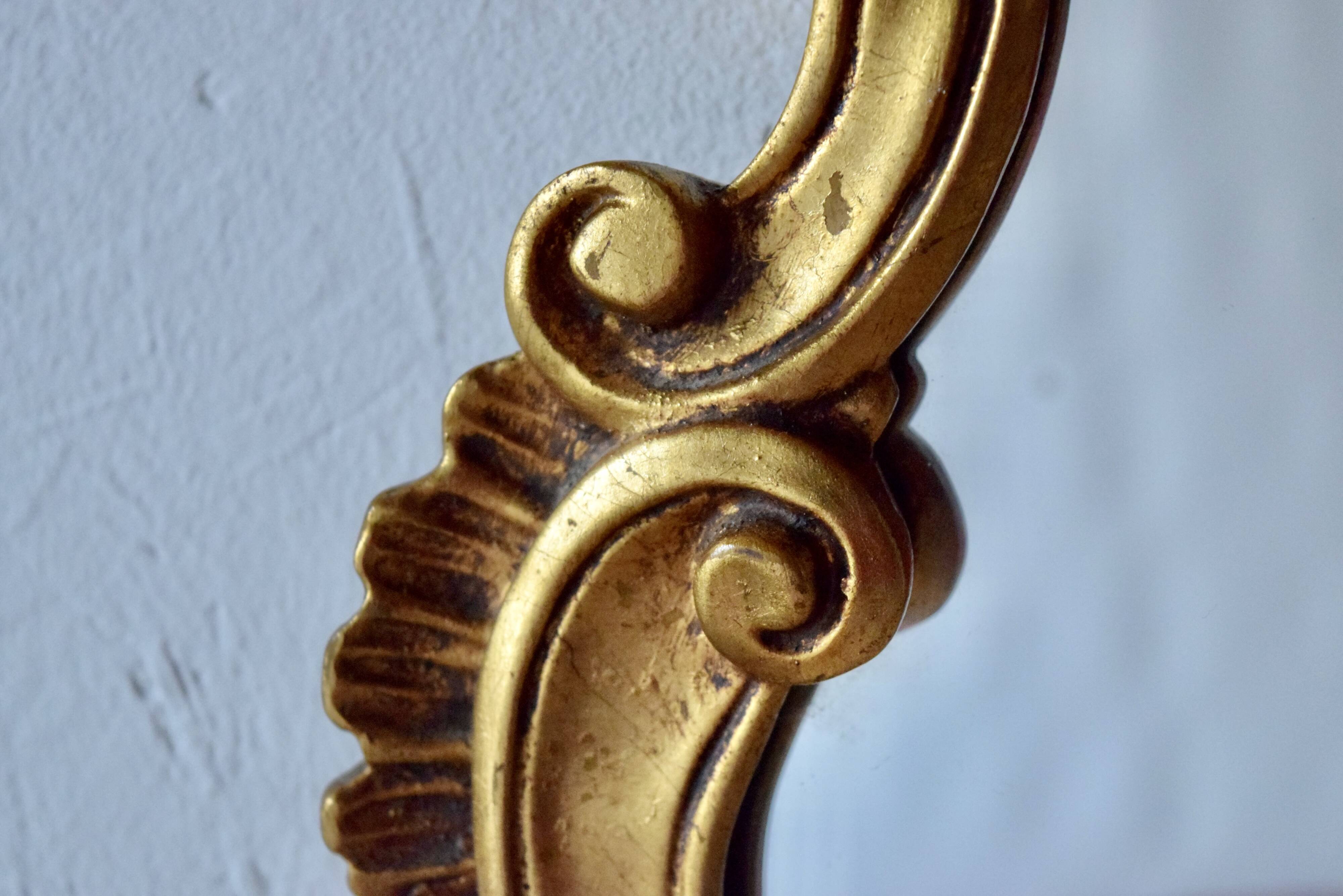 Old wall mirror in golden resin - rococo style