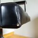 Swivel office chair Strafor with chrome metal and black faux leather.