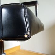 Swivel office chair Strafor with chrome metal and black faux leather.