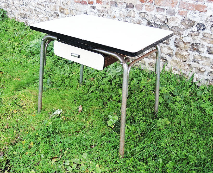 Old extendable table in yellow formica