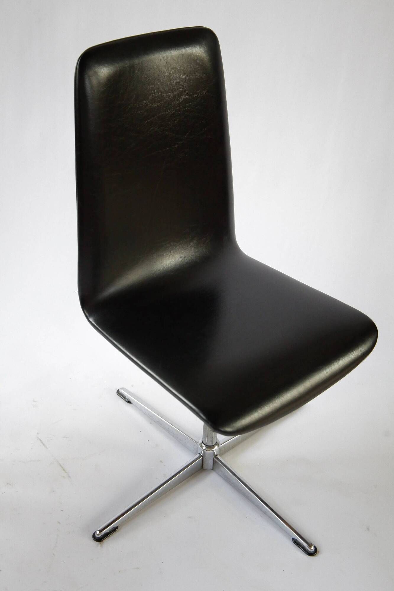 Pair of vintage swivel armchairs in black vinyl, 1970s