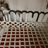 Perforated metal shelf