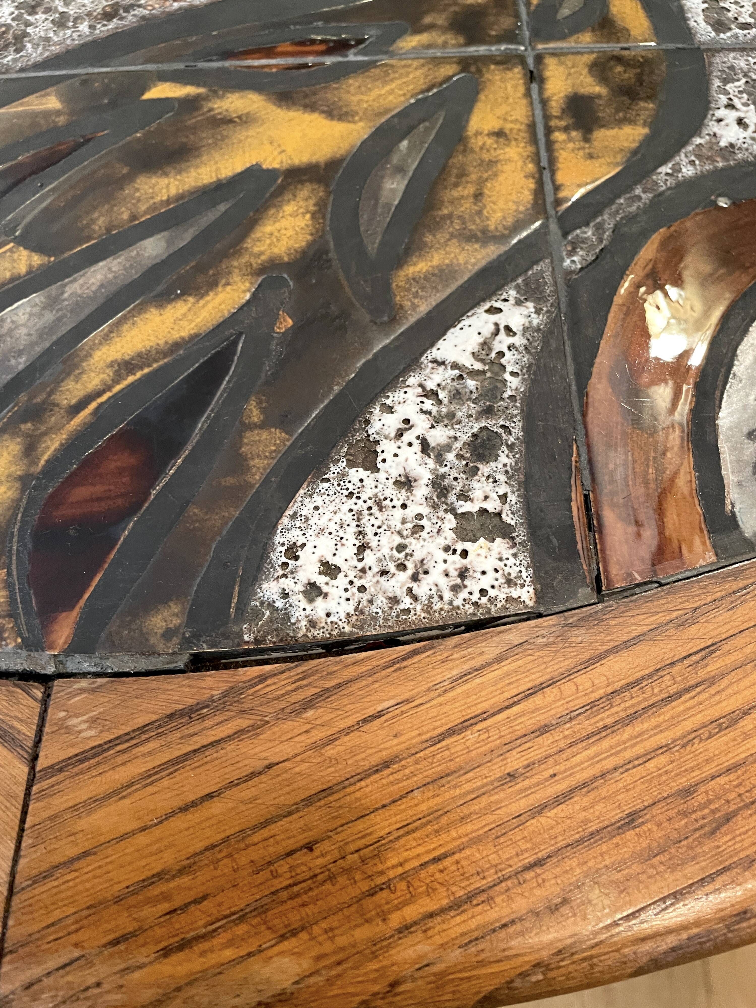 Ceramic coffee table with metal base by G. Reynaud Vallauris