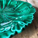 Plate with botanical leaves in green enameled earthenware from Clairfontaine circa 1890