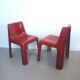 Pair of red fibreglass chairs from the 1970s.