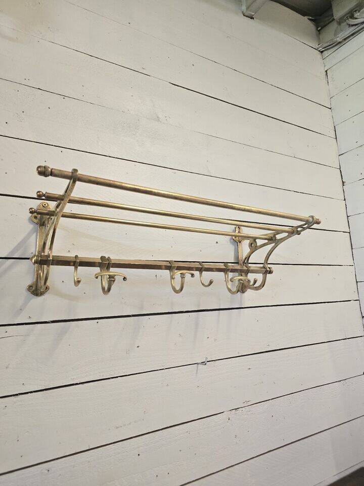 Wall-mounted coat rack with brass hat rack