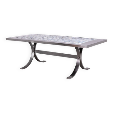 Polished metal and ceramic dining table. 1970s.
