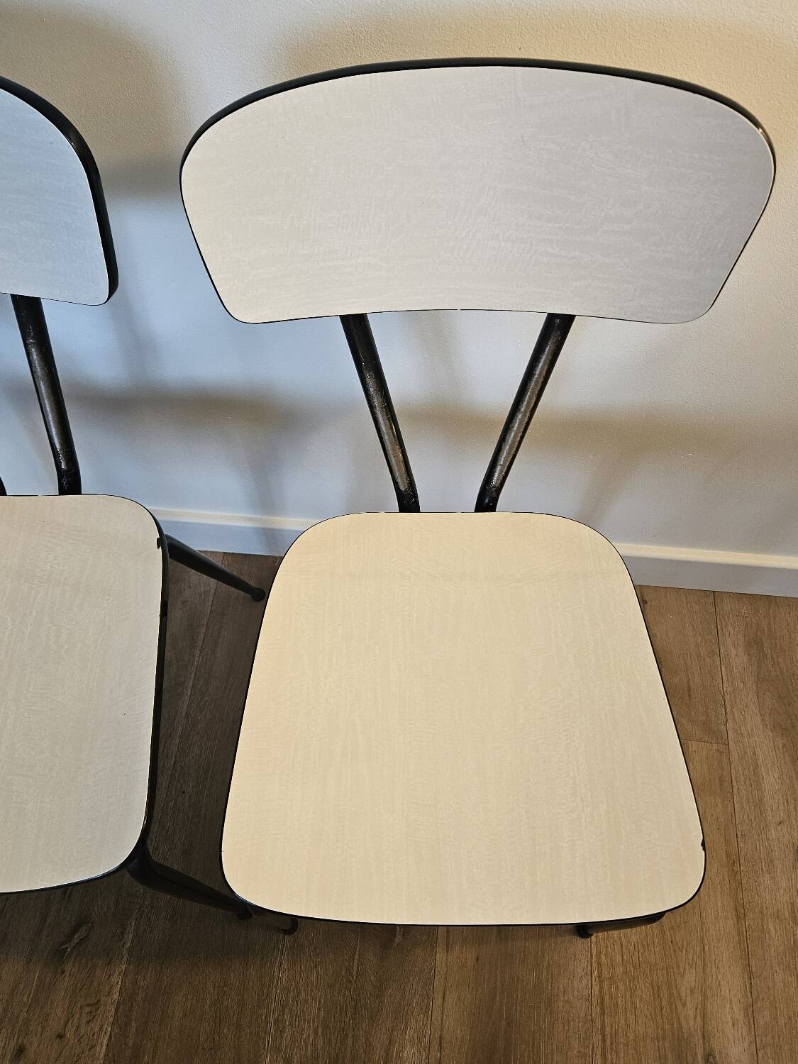 Pair of white formica chairs