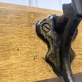 Antique wooden coat rack with metal hooks