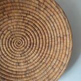 Ethnic plateau in woven palm leaf