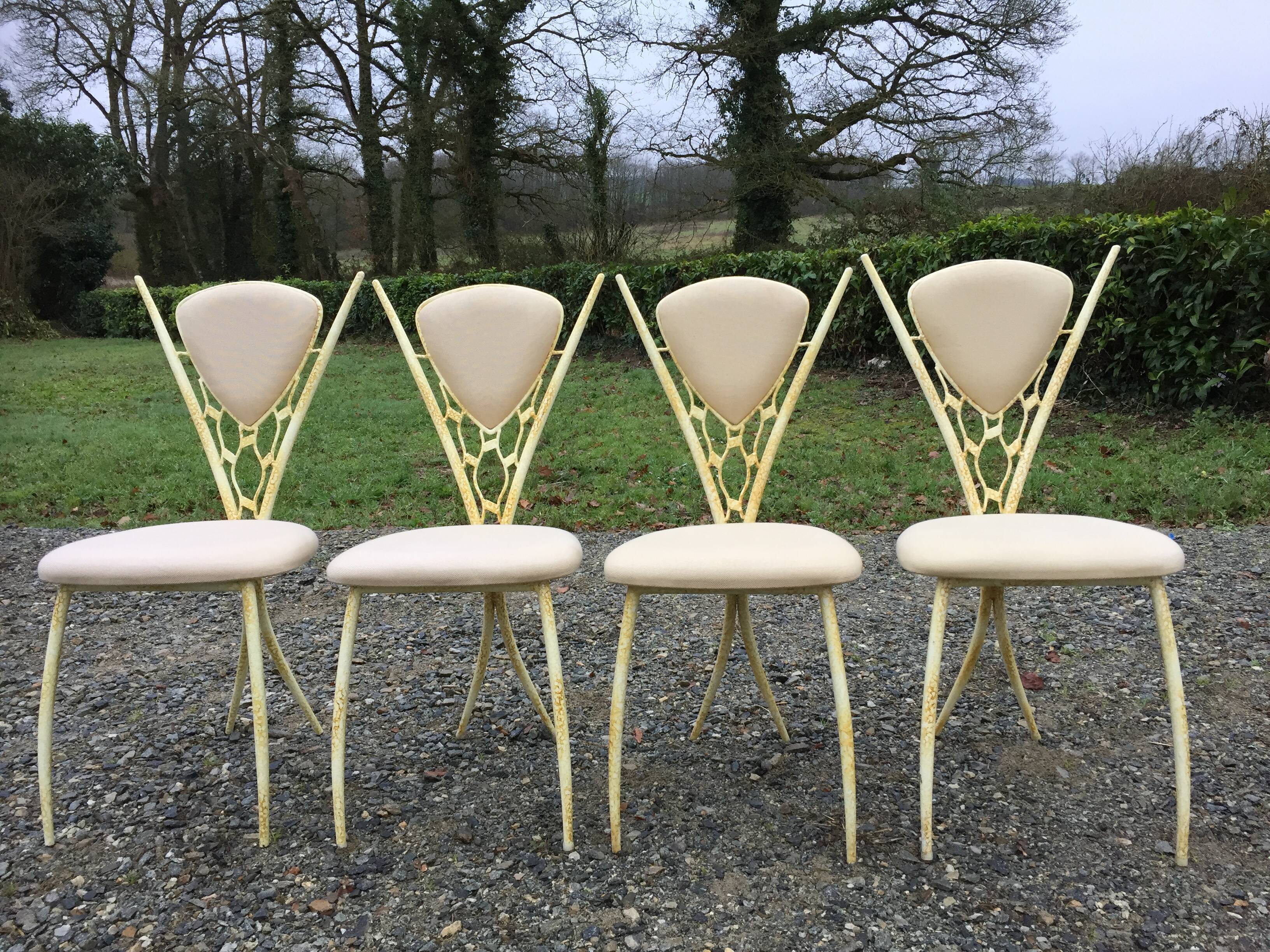 4 vintage chairs in tubular metal lacquered white yellow.