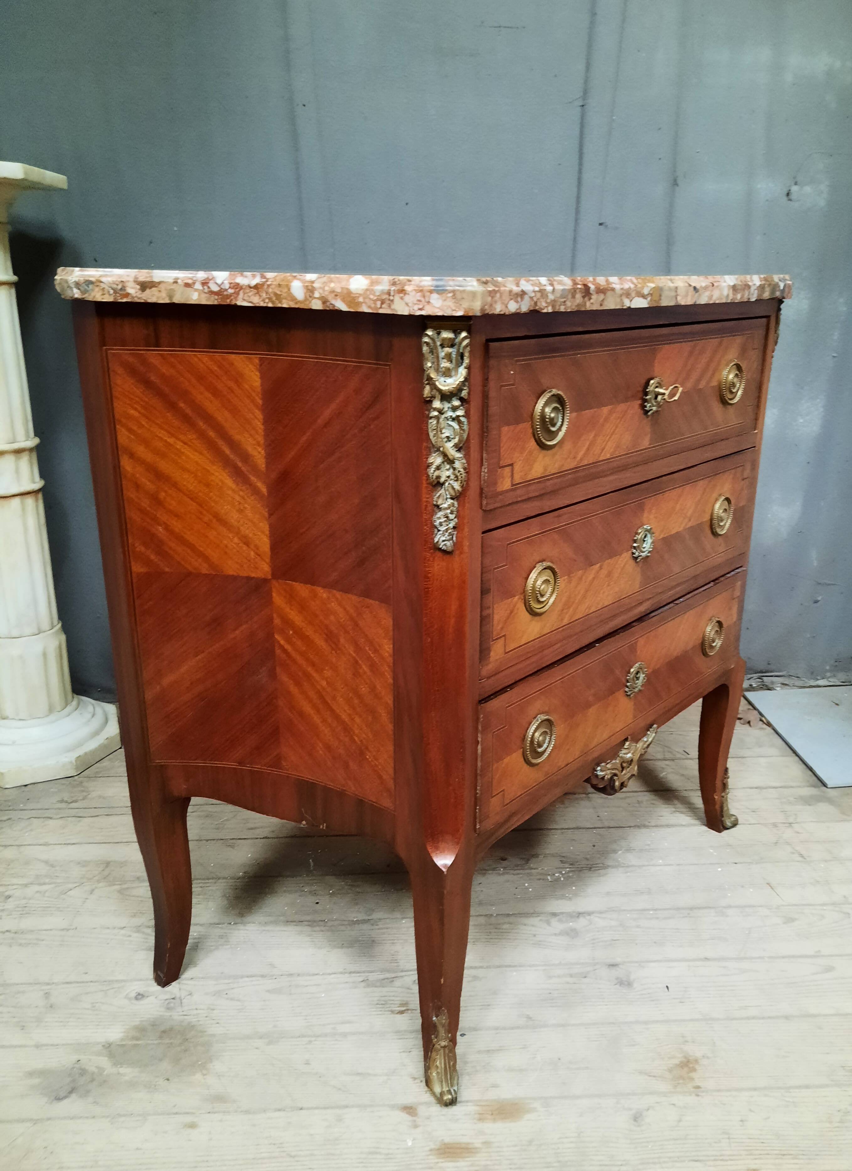 Transitional marquetry chest of drawers