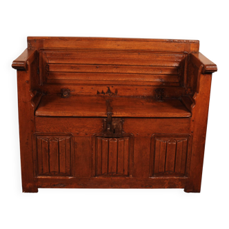 Oak bench chest with incorporated panels and gothic elements
