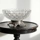 Pressed glass coupe with diamond points, antique from 1920-1950 on a pewter base.