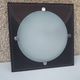 Wall light or ceiling light in frosted glass and leather-like material.