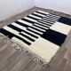 Off-white Moroccan rug with geometric patterns, 250cm x 150cm