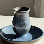 Vintage hand-held candlestick in blue glazed stoneware with floral decoration by Poterie Millian.