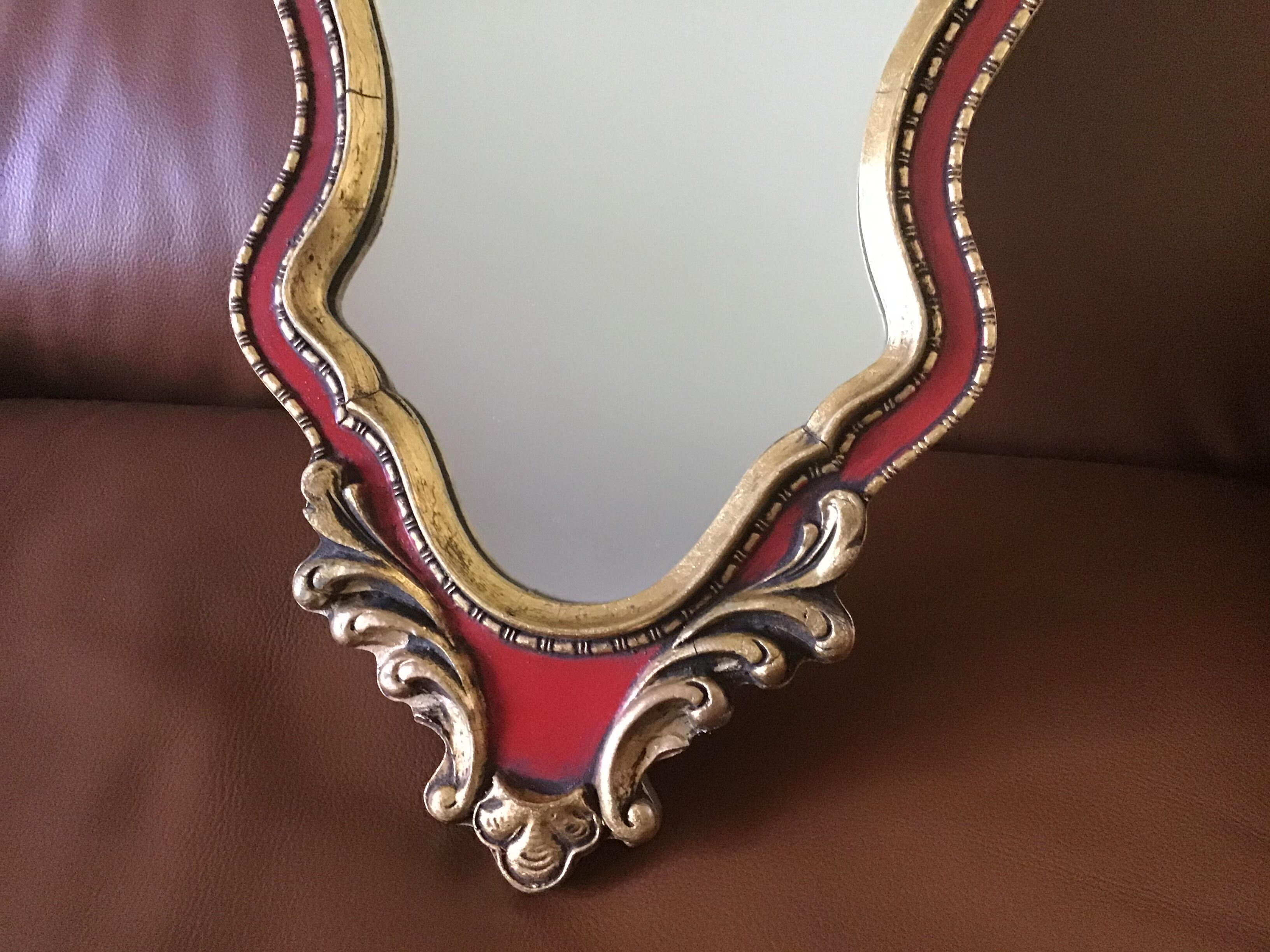 Gold and red mirror brand Deknudt