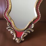Gold and red mirror brand Deknudt