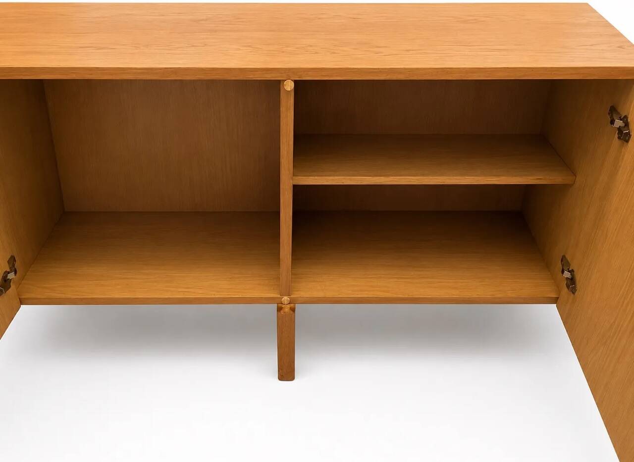 Scandinavian teak sideboard by Ib Kofod Larsen for Faarup Mobelfabrik.
