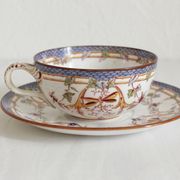 Tasse à café en terre de fer décor Minton mauve Sarreguemines fin XIXe