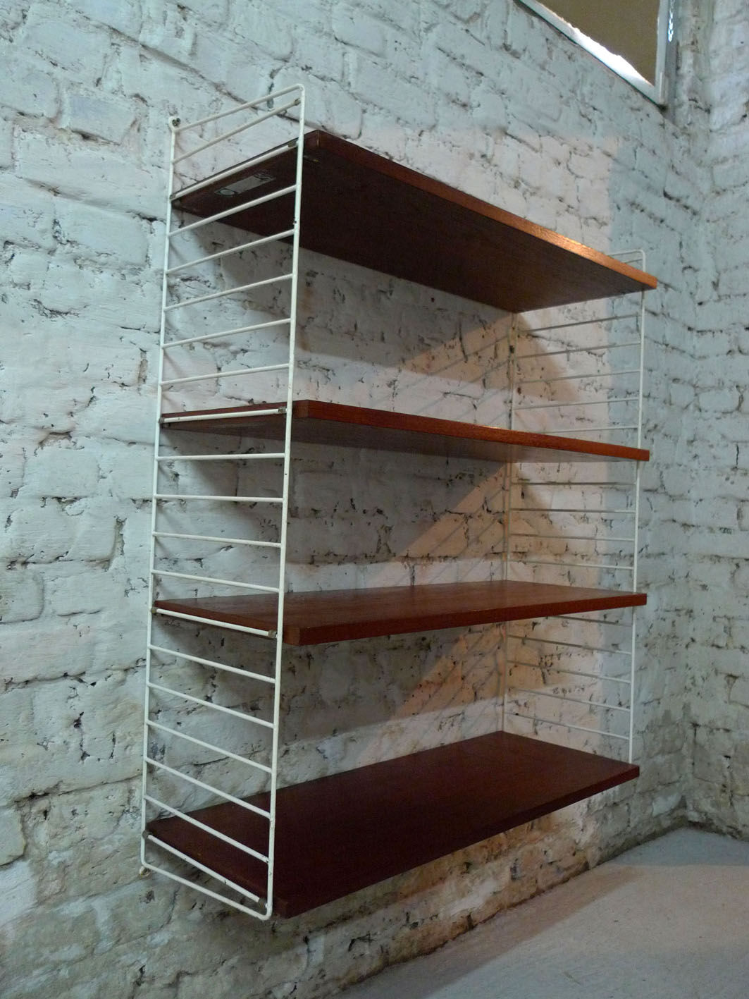 large shelf of Nils Strinning