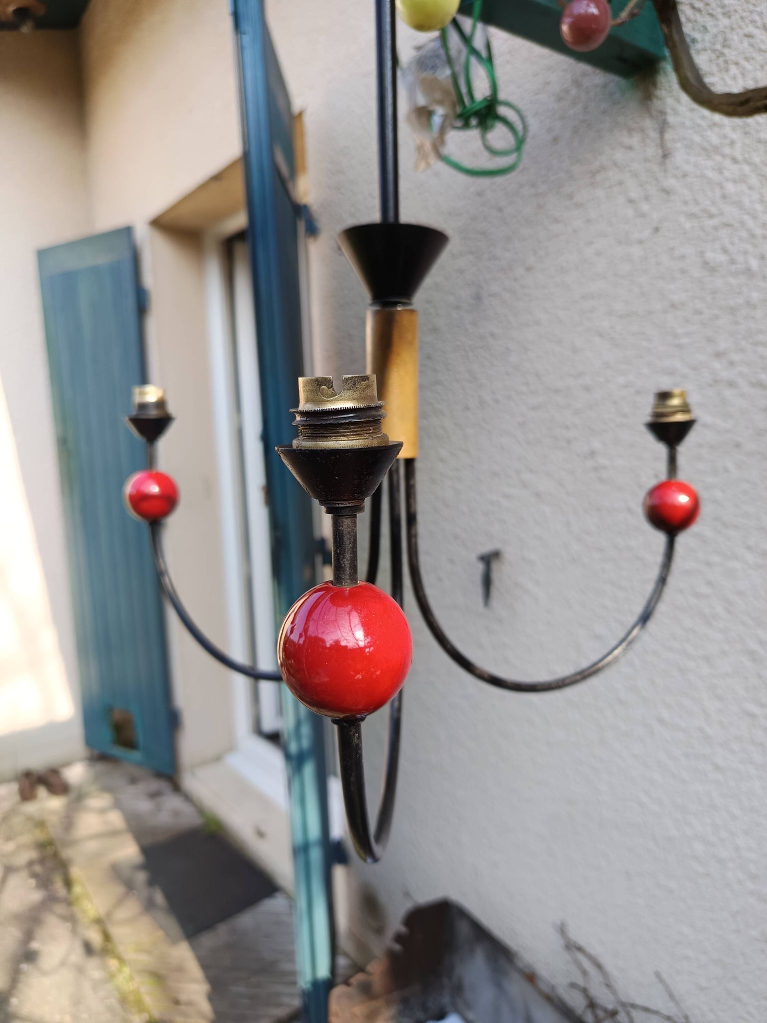 pair of vintage black metal chandeliers with red balls 1950/1970