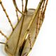 Rare Mid Century Modern magazine rack made of solid brass and genuine bambo