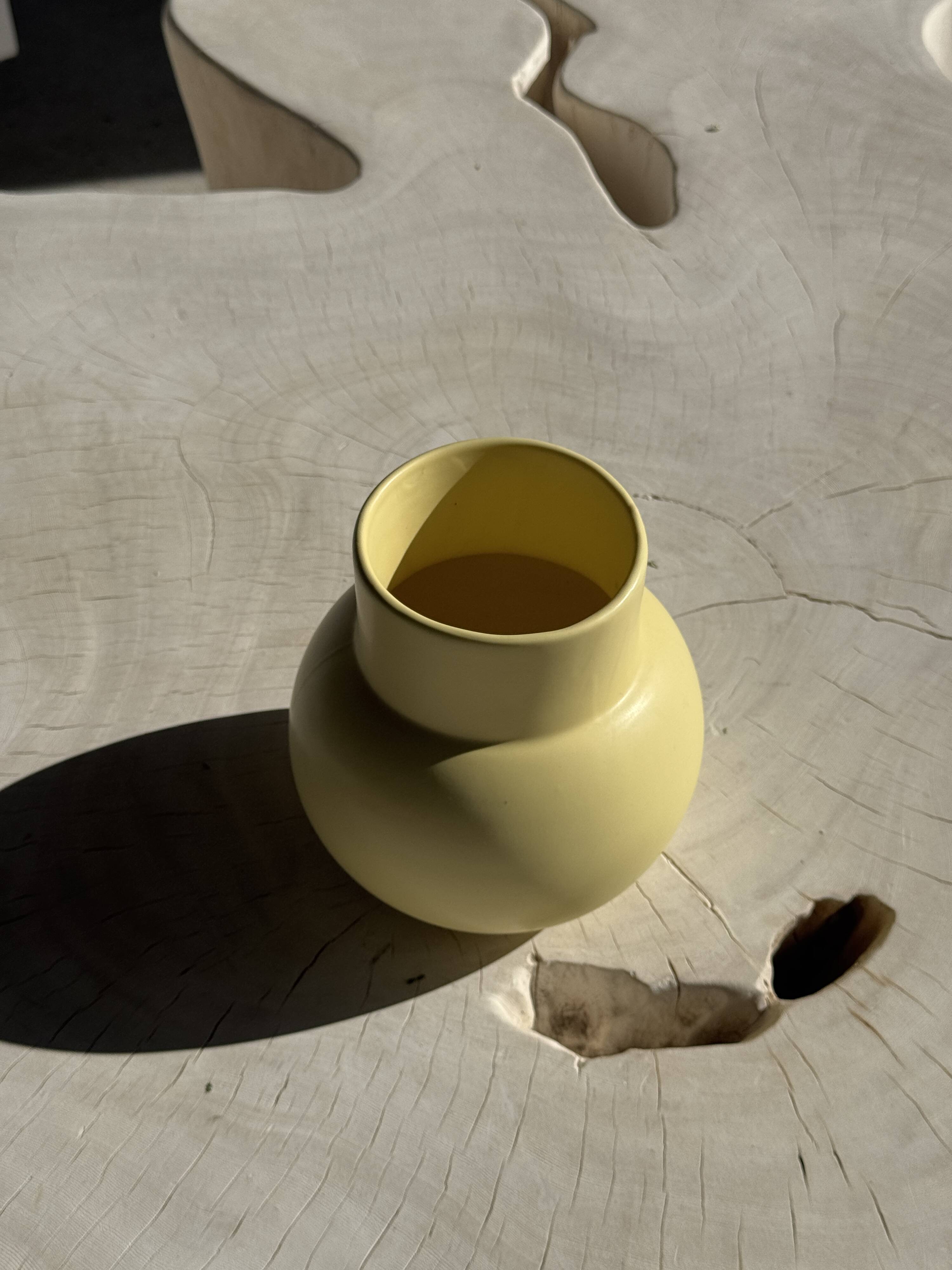 Small light yellow ball vase