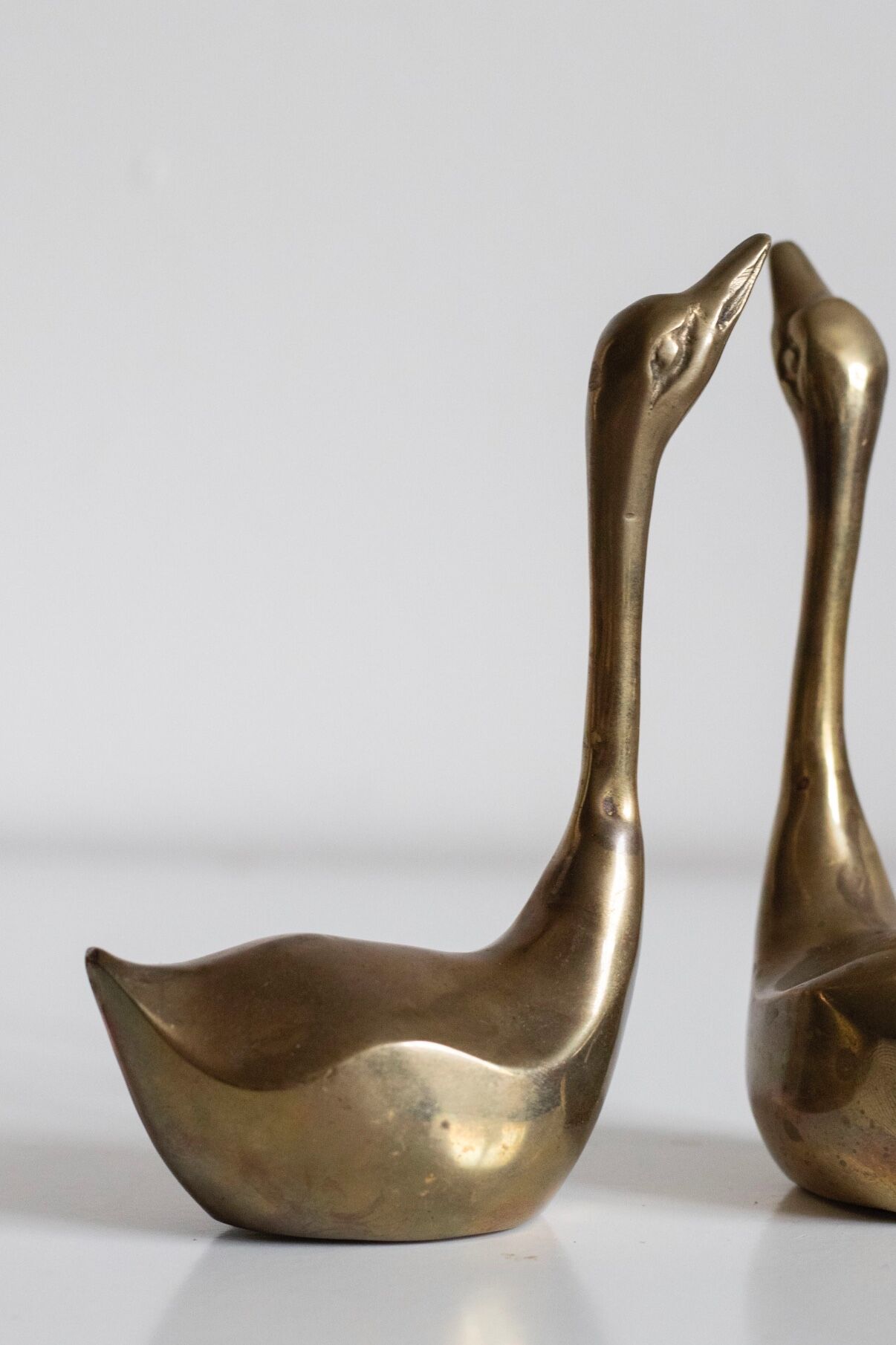 Pair of vintage brass swans