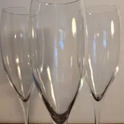 3 large crystal champagne flutes. No brand.