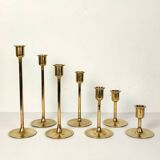 Set of 7 brass candlesticks