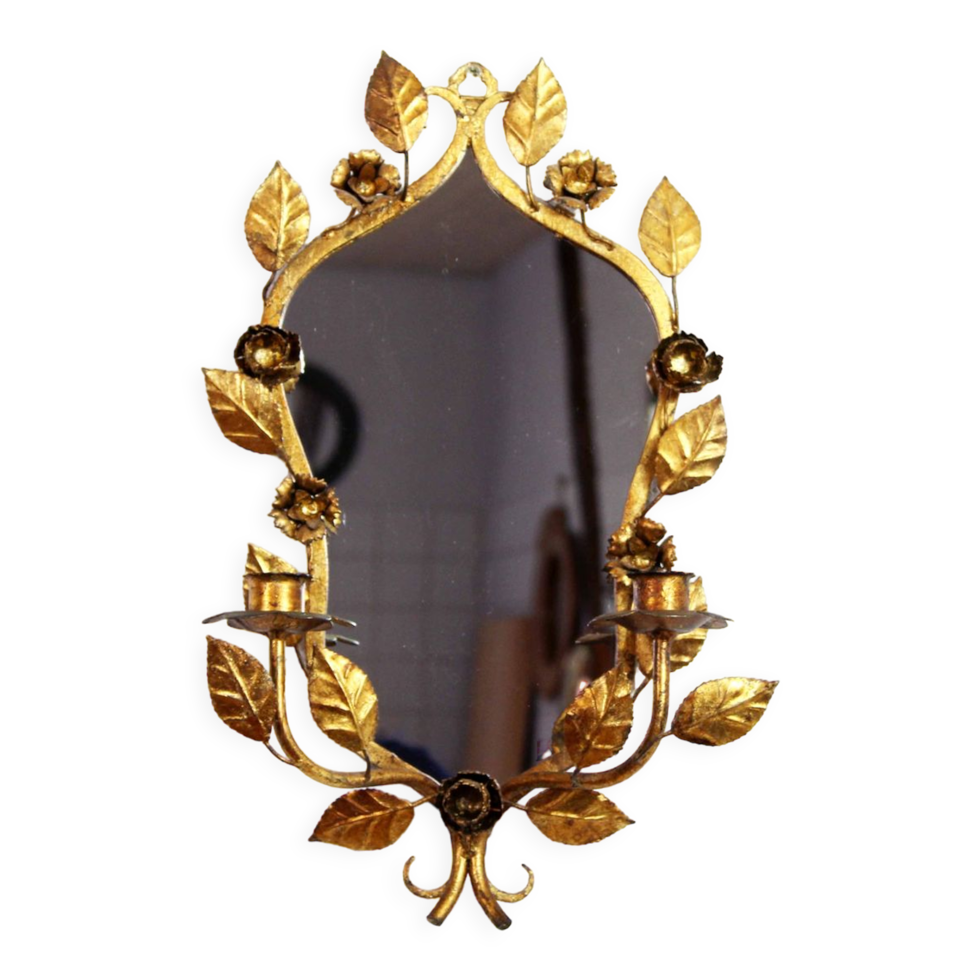 Old candlestick mirror gilded with leaf