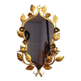 Old candlestick mirror gilded with leaf