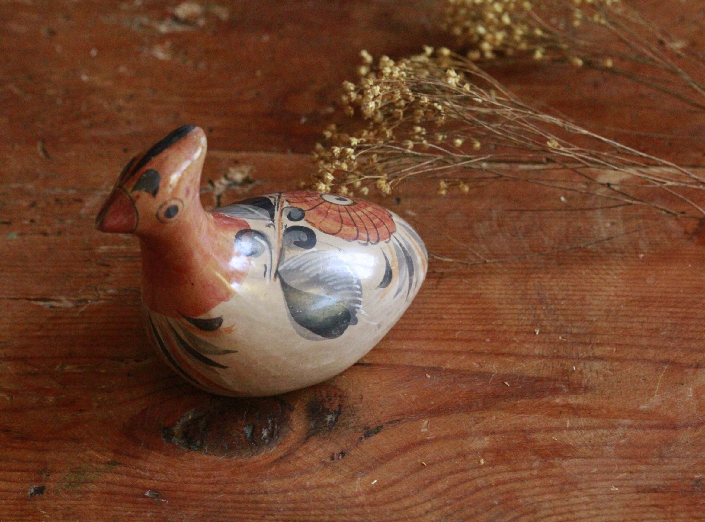 Ancient Mexican bird statue in ceramic