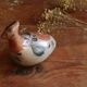 Ancient Mexican bird statue in ceramic