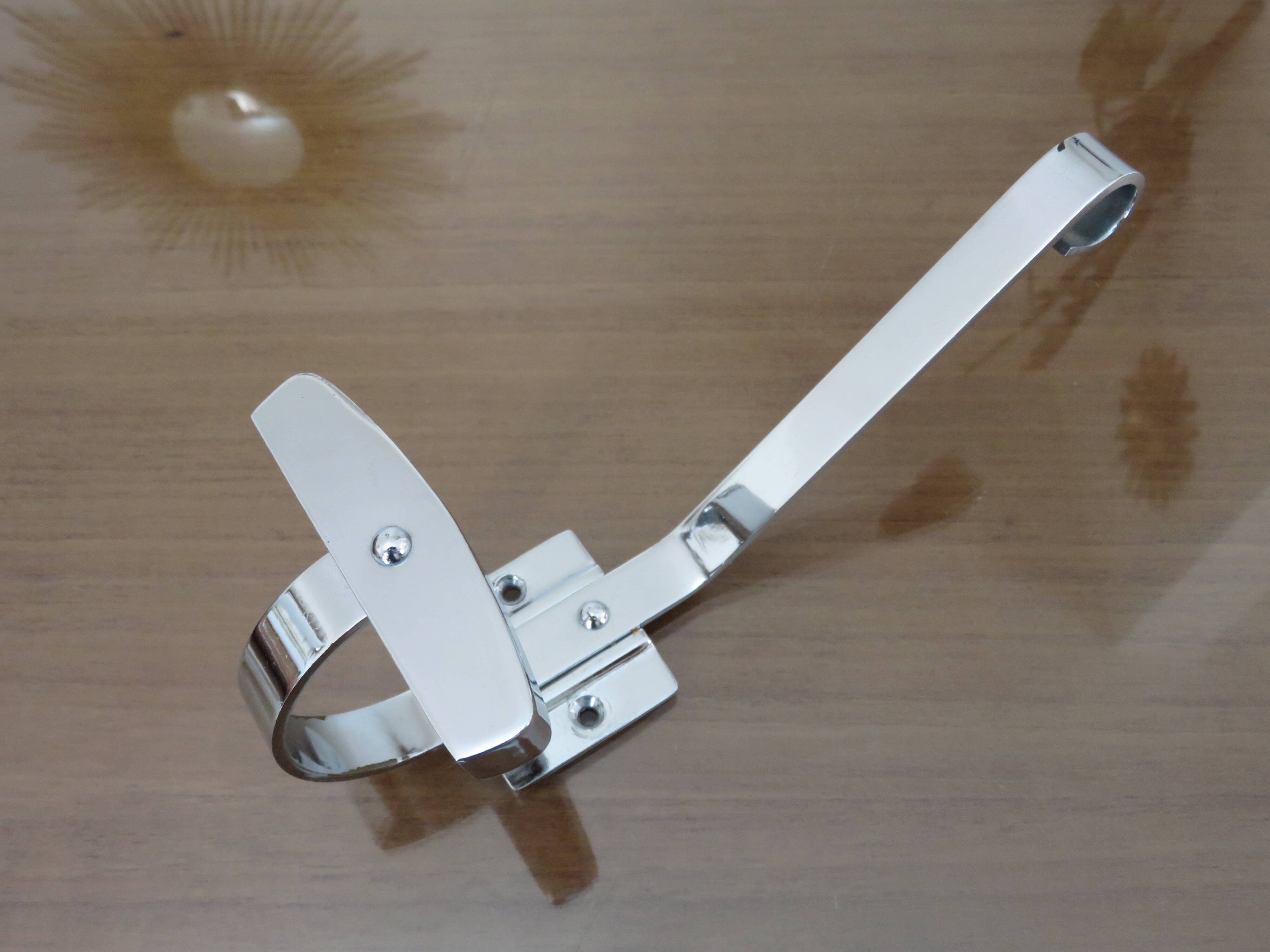 Pair of chrome metal coat hooks from the 1970s.