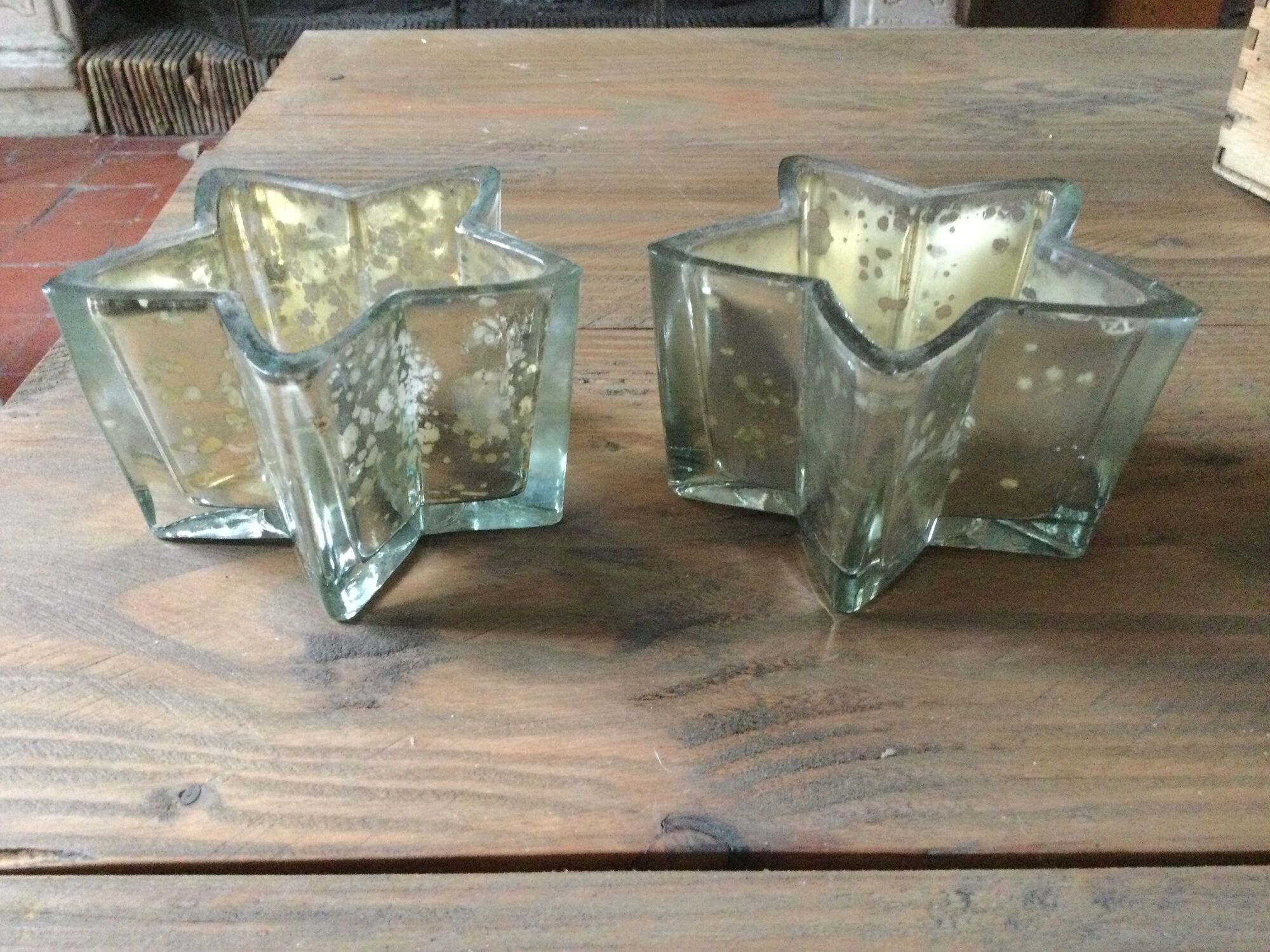 Pair of mercurized glass candle holders in the shape of stars