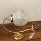 Duo of brass and glass wall lamps