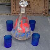 Peacock pattern liqueur decanter and 4 small vintage cobalt blue glasses