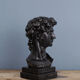 David head in black waxed bean