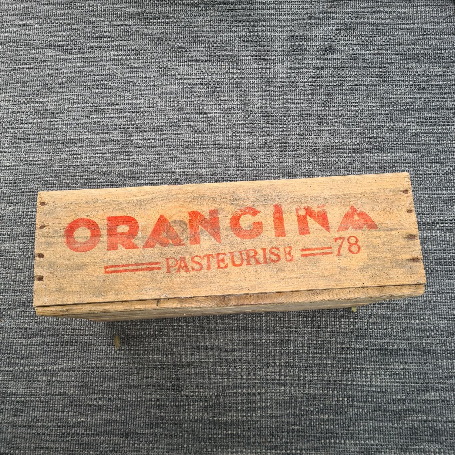 Old wooden box: orangina