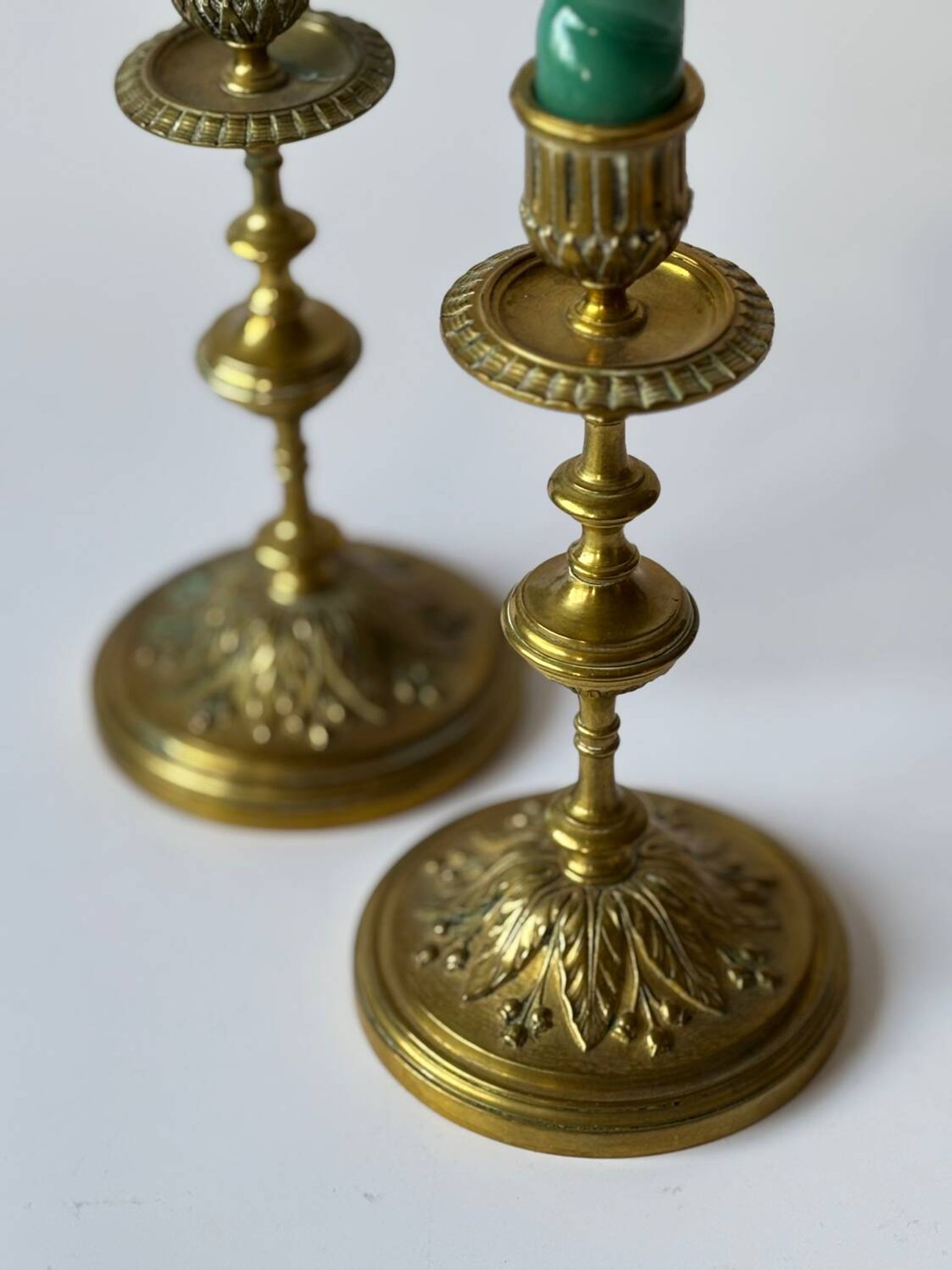 Pair of neoclassical brass candlesticks