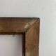 Ancien cadre en bois sculpté
