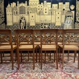 Suite de 9 chaises en cannage de style Empire - Consulat