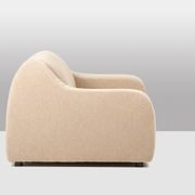 A pair of large and comfortable beige fabric armchairs. Contemporary.
